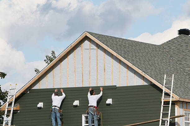 Professional Siding Contractor technician working in Normalville, PA